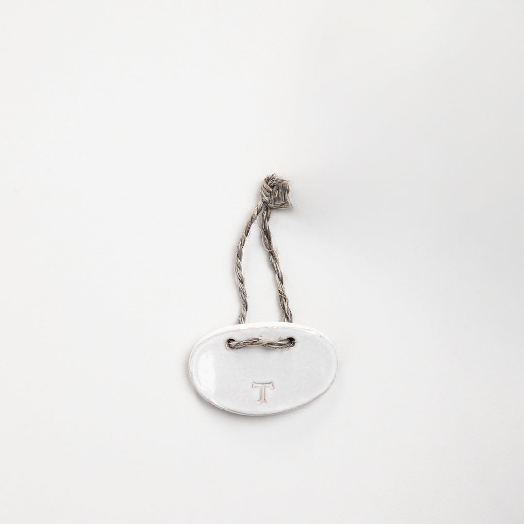 PLACA CACHARRO PARA BOTELLA 7CM L