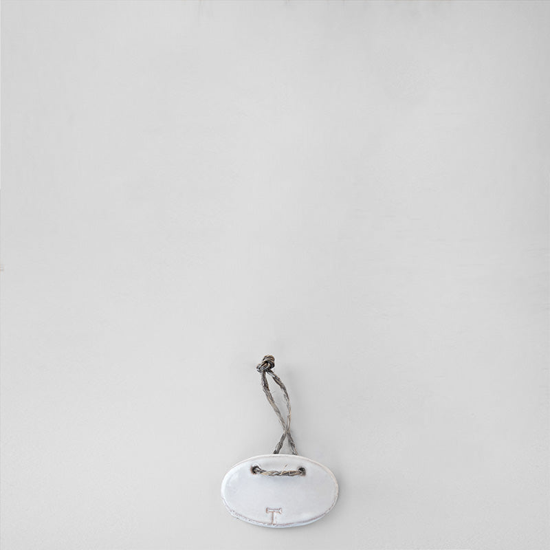 PLACA CACHARRO PARA BOTELLA 7CM L | Trinitate