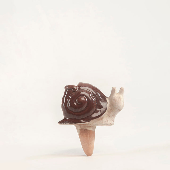 DOSIFICADOR CARACOL 12CM AL 11CM L 9CM AN